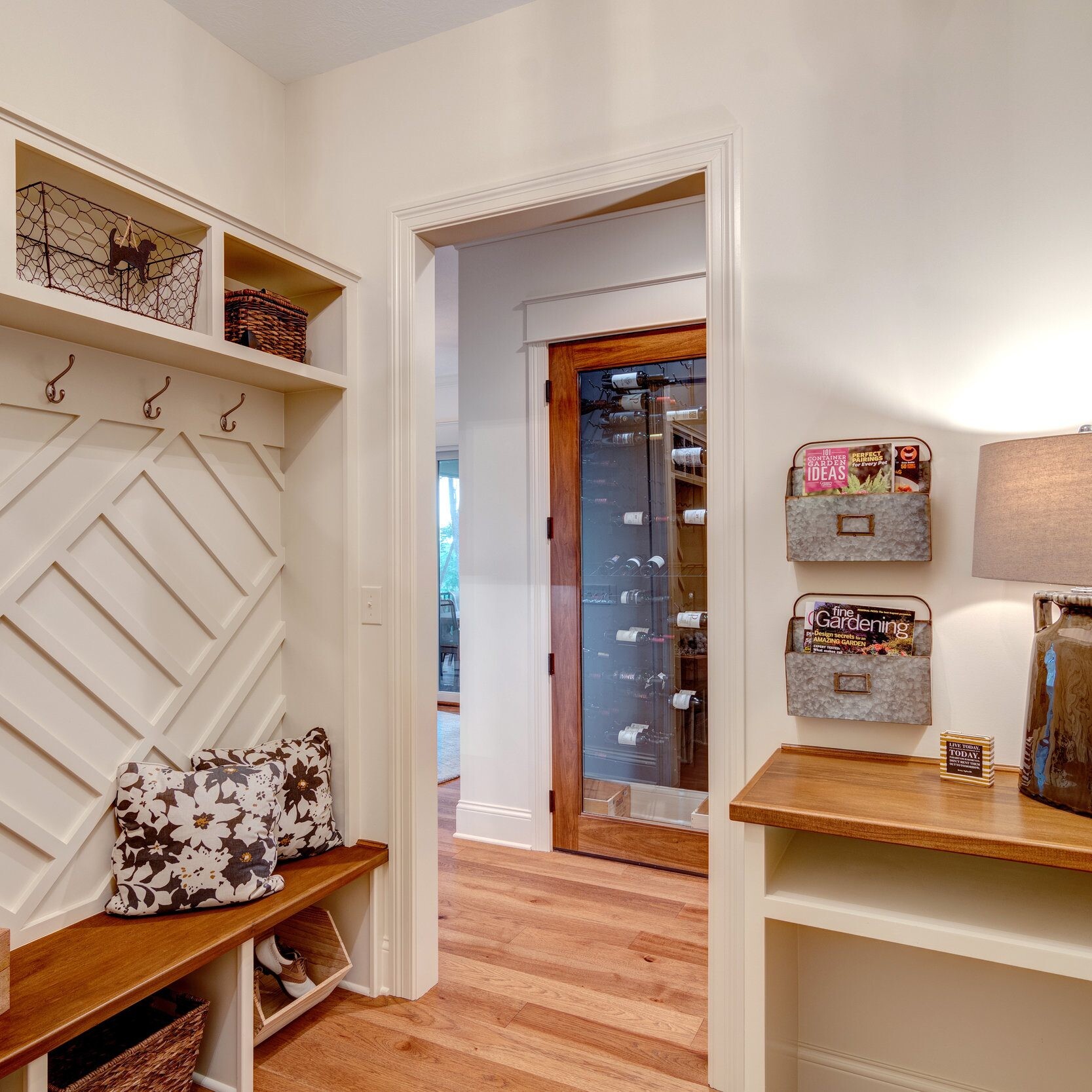 A mudroom with a bench and shelves, perfect for your new home construction in Indianapolis or custom home build in Carmel, Indiana.