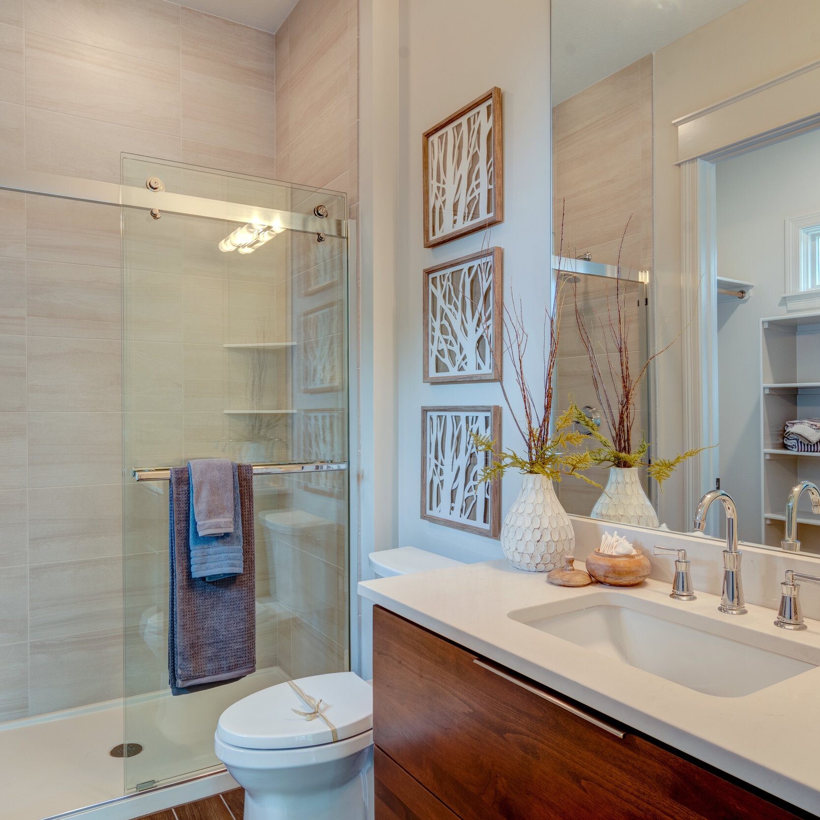 A glass shower stall in a custom home.