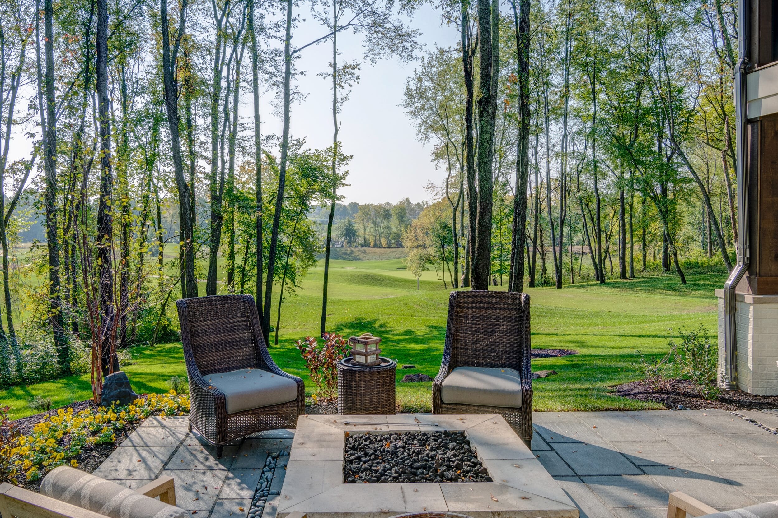 A custom home builder in Carmel, Indiana or Fishers, Indiana can create a patio that features furniture and a fire pit. Whether you're looking for a new home or wanting to upgrade your current