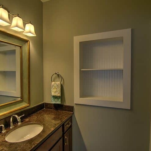 A luxury bathroom with a sink and a mirror.