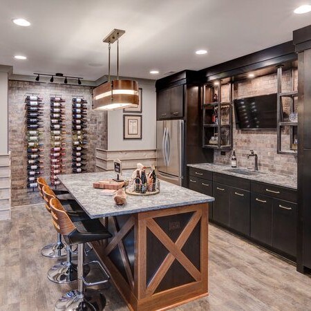 A kitchen with a bar and wine racks in a new home construction in Indianapolis, Indiana.