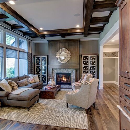 New home construction in Indianapolis featuring a living room with hardwood floors and a fireplace.