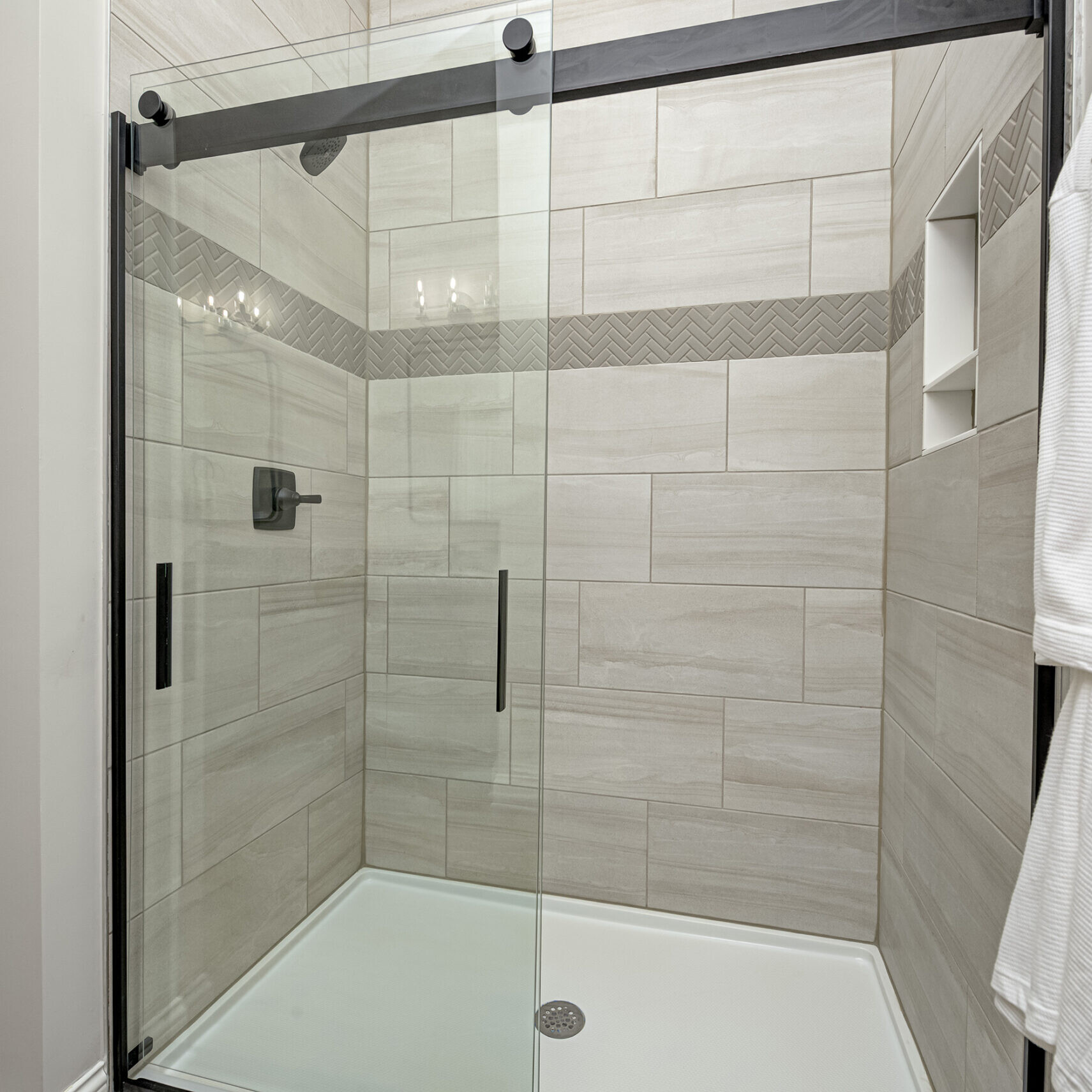 A Indianapolis custom home bathroom with a glass shower door.