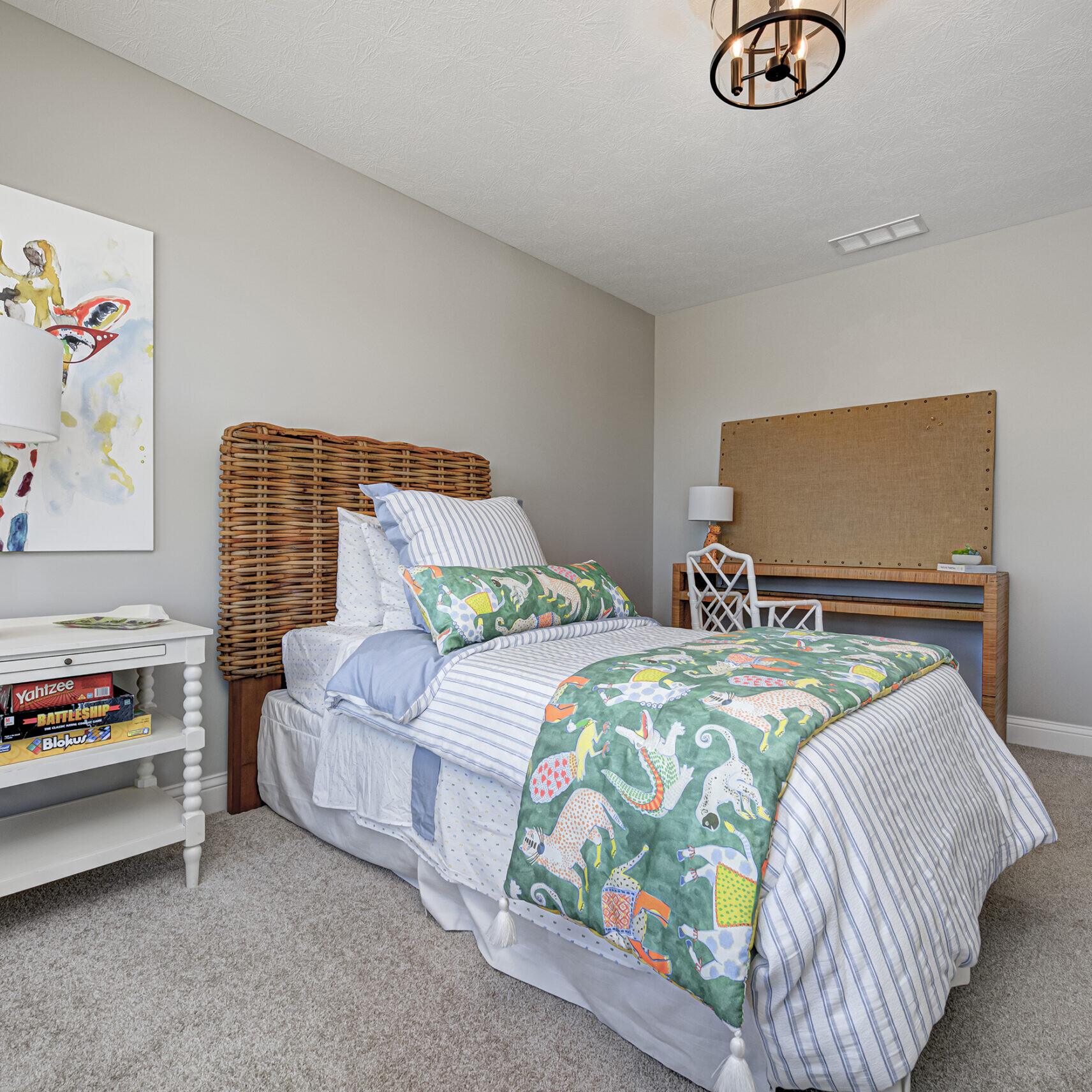 Custom Home Builder Carmel Indiana: A bedroom with a bed and a desk.