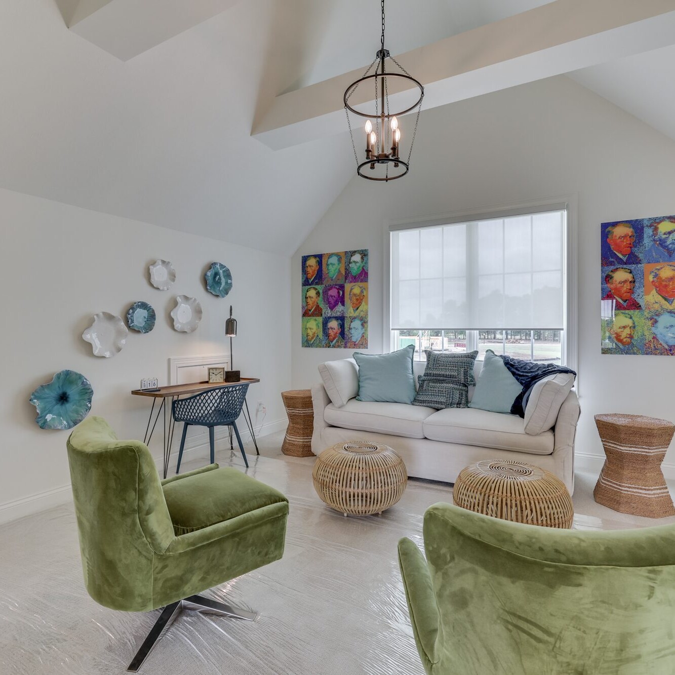 A living room with a couch and chairs.