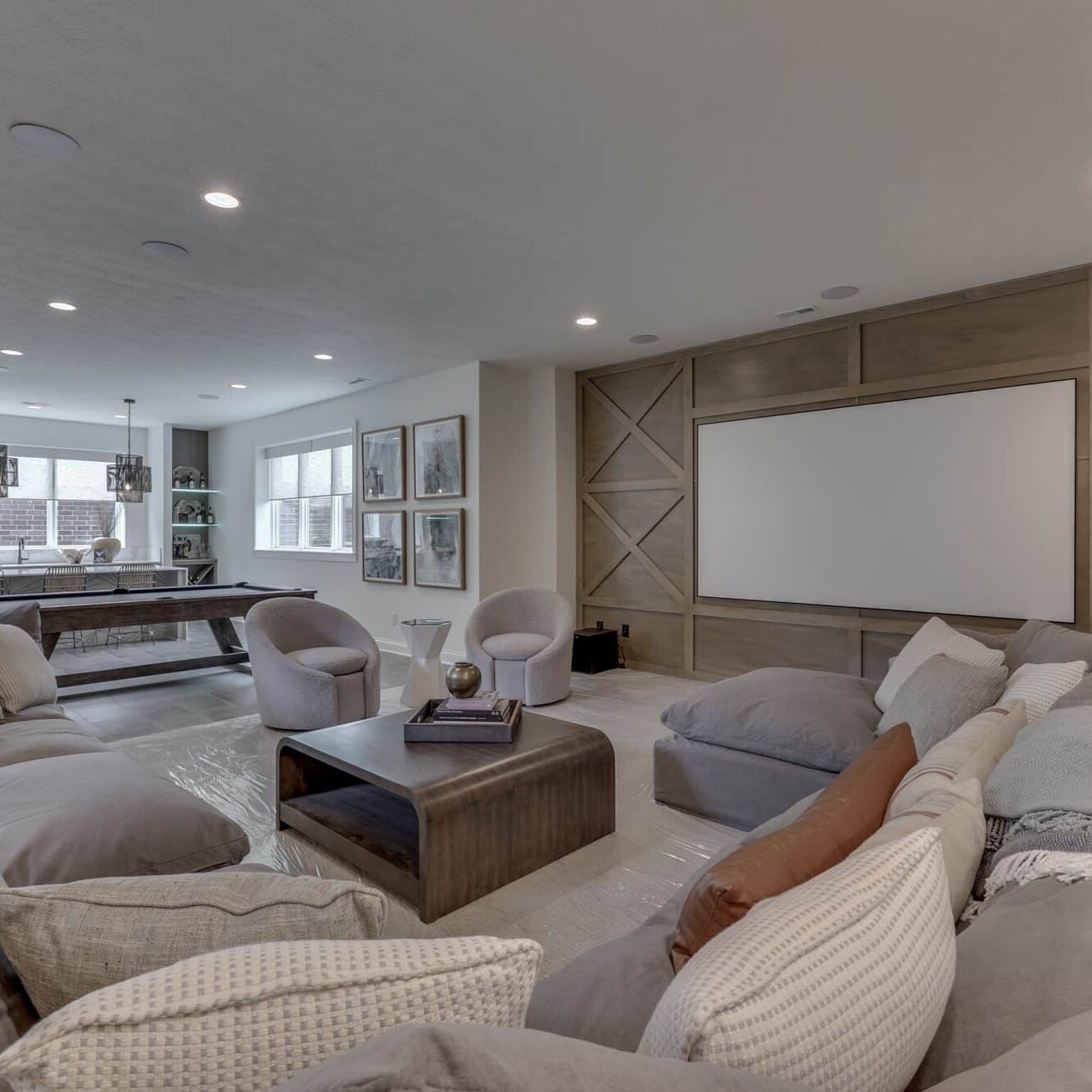 A living room with couches and a tv.