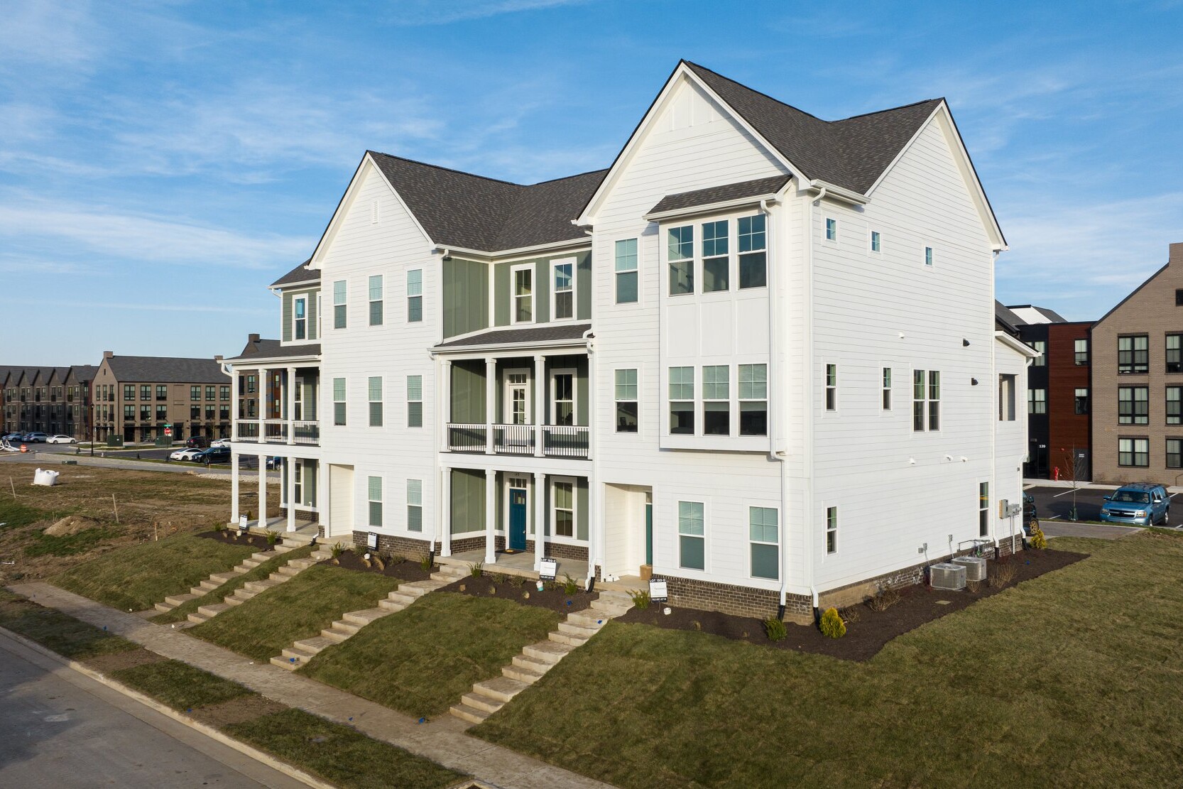 An aerial view of a two-story townhouse featuring custom homes in Westfield, Indiana.