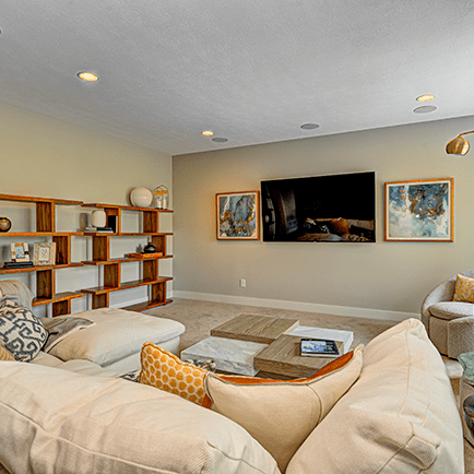 A white couch in a living room.