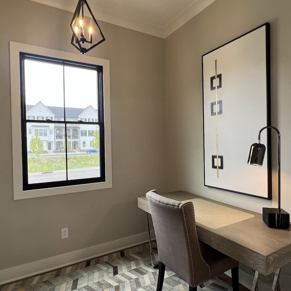 A custom home builder in Carmel Indiana takes pride in creating Indianapolis custom homes and designing spaces that truly reflect each client's vision. This particular room showcases their attention to detail, with a spacious