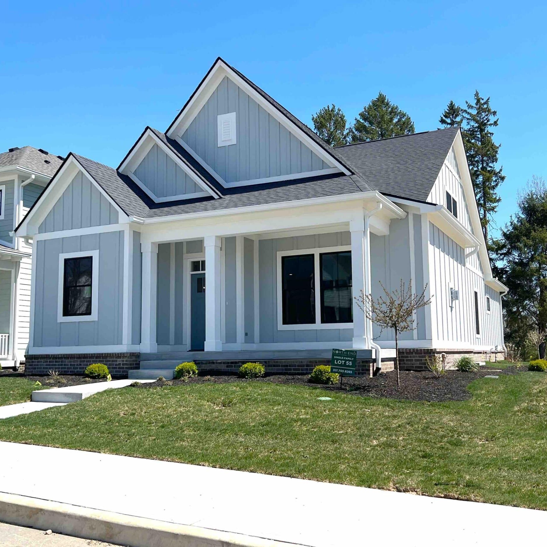 A custom-built two story home in a suburban neighborhood.