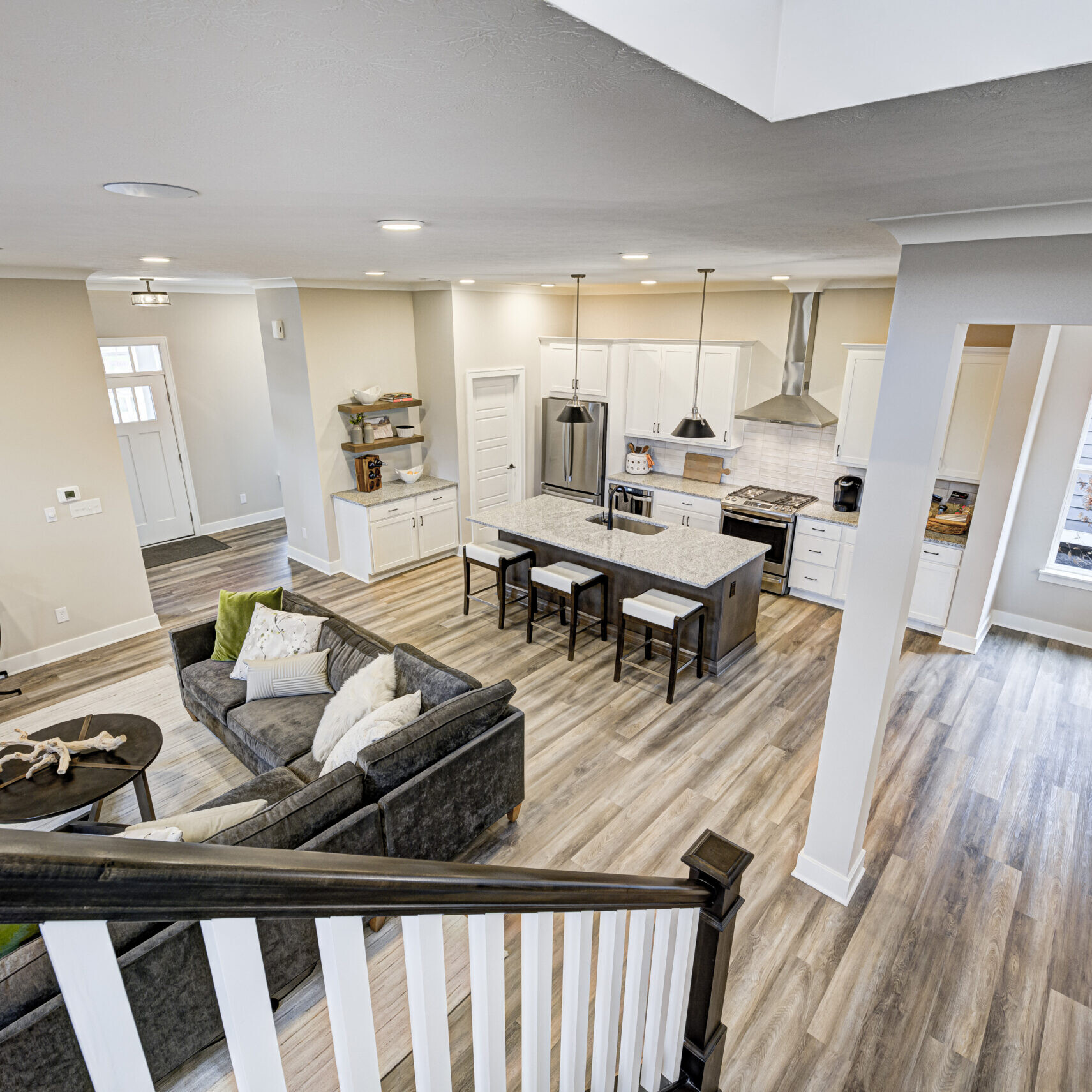 A view of the living room and kitchen in a custom home builder Fishers Indiana.