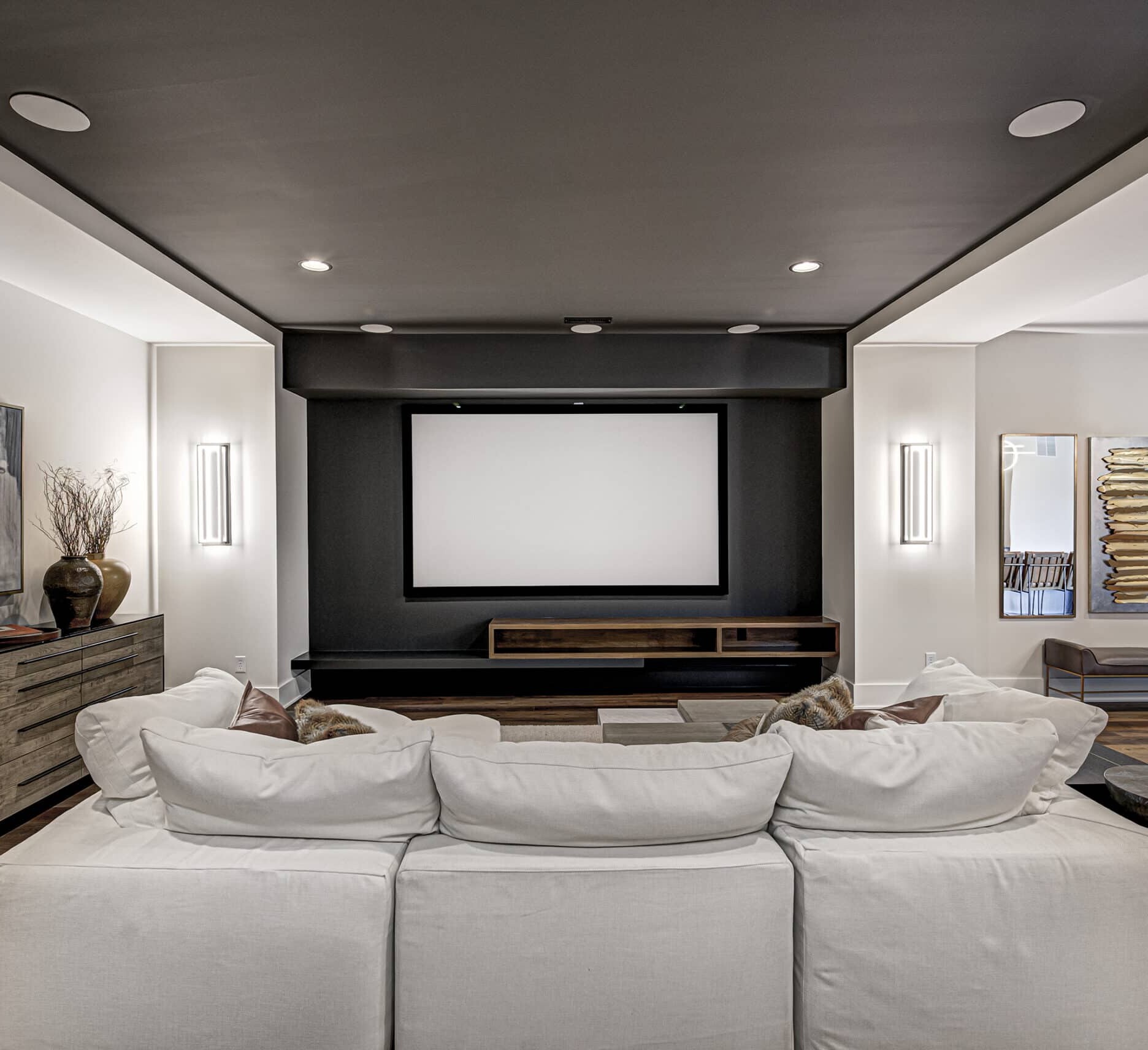 A modern living room with a flat screen tv.