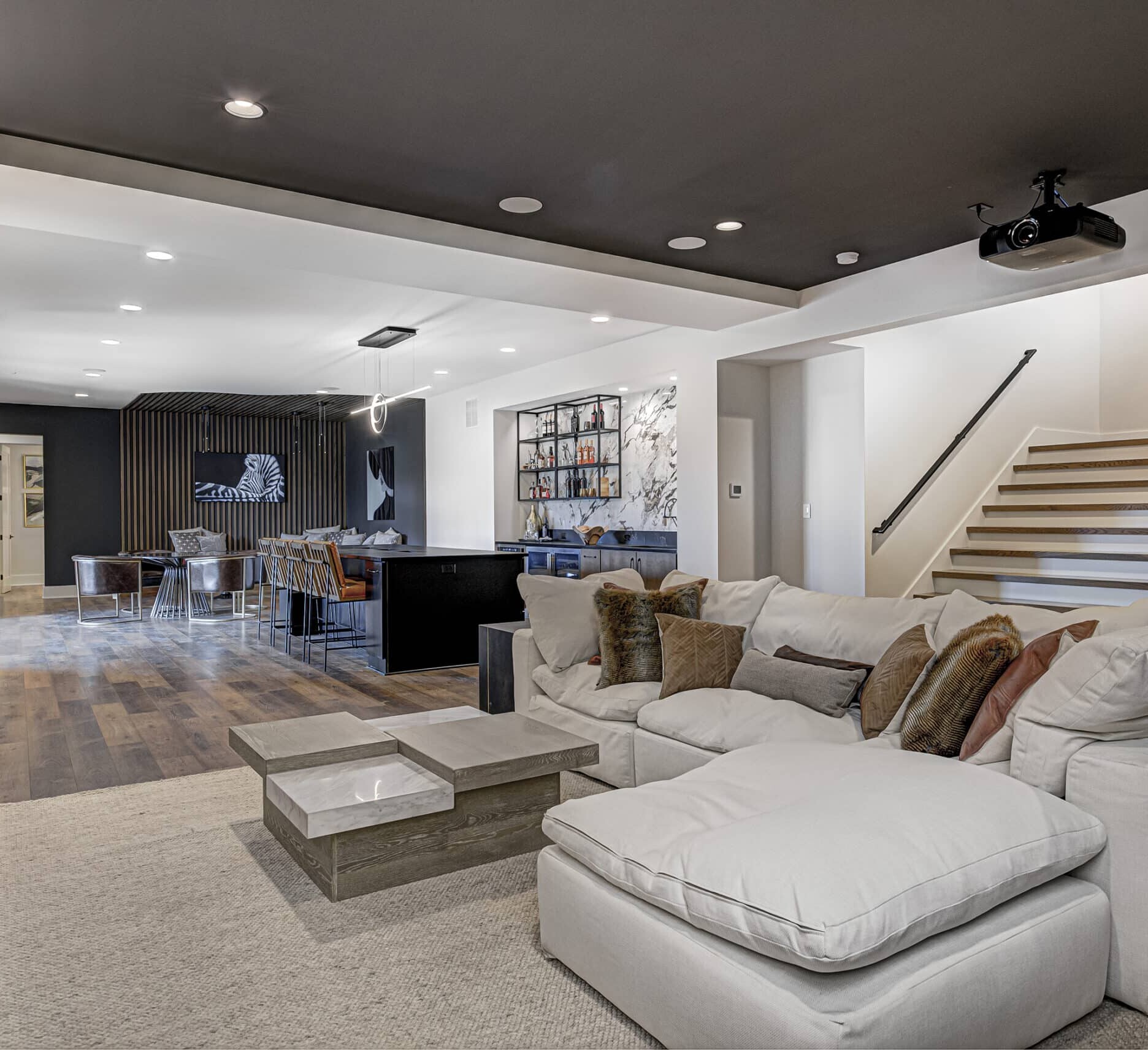 A living room with hardwood floors and a fireplace.